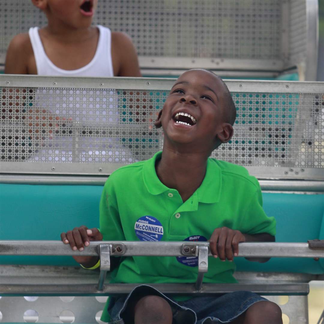 Brayden-Young-enjoys-ride-at-African-American-festival