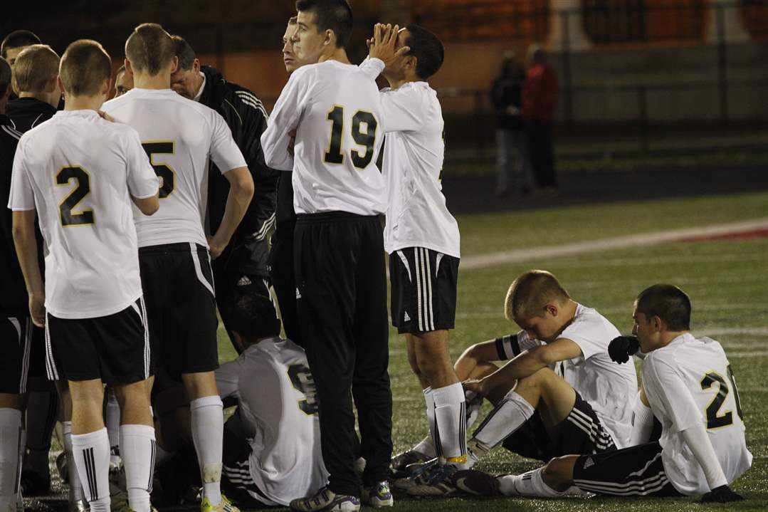 Perrysburg-team-reacts-to-a-loss-to-St-John-s