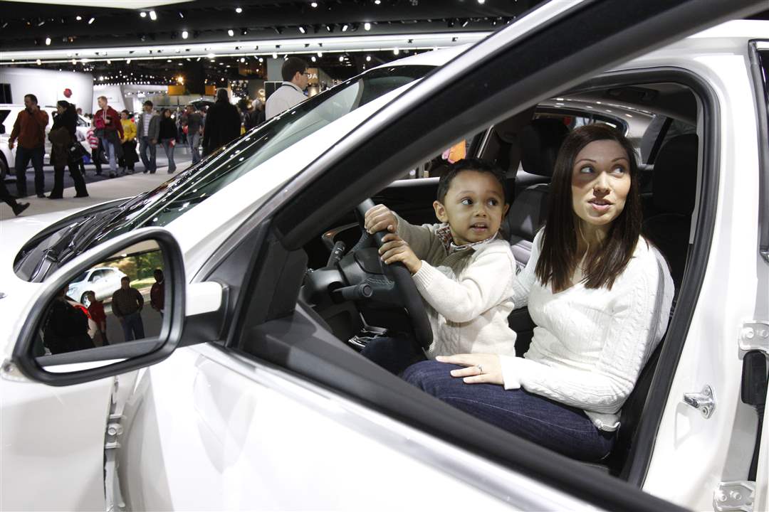 Gabriel-Carter-3-tests-out-the-drivers-seat-with-his-mom-Katherine-Carter-of-a-Buick-Regal-GS