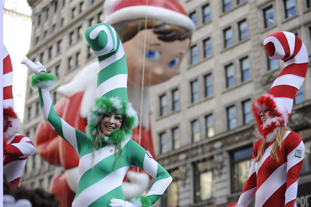 Candy-Cane-girls-pass-by-Herald-Square