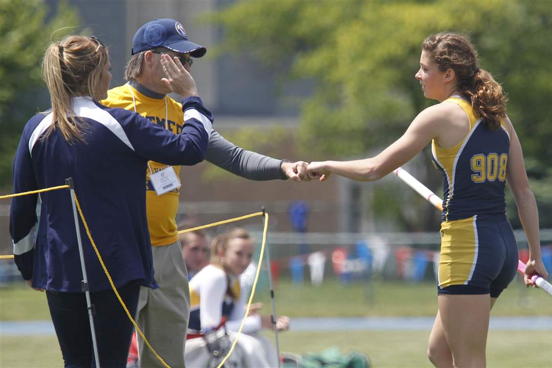 Whitmer-s-Kaitlyn-Barber-fist-bumps-her-coaches-after-winning-the-pole-vault