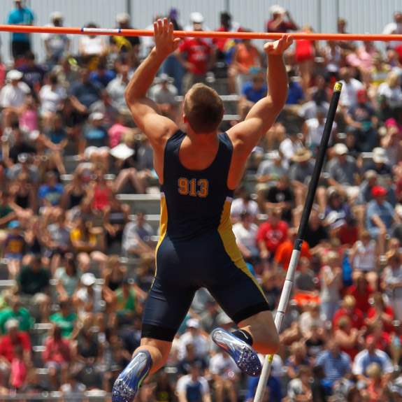 Toledo-Whitmer-s-Nick-Holley-hits-the-pole-at-14-feet-9-inches-in-the-pole-vault