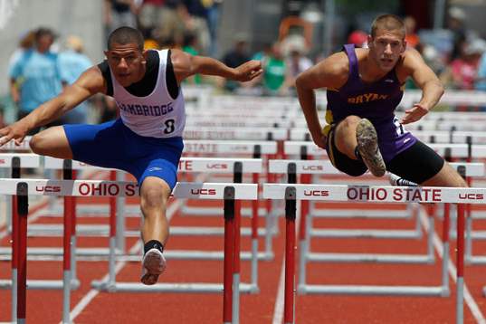 Bryan-s-Brandon-Poncsak-right-competes-in-the-110-meter-hurdles