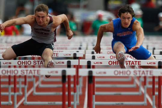 Patrick-Henry-s-Zach-Nye-right-competes-in-the-110-meter-hurdles