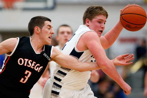 Lake-s-Jacob-Rettig-22-steals-from-Otsego-s-Jalen-Myers-3