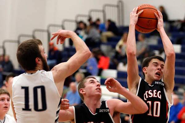 Otsego-s-Josh-Horseman-10-pulls-in-a-rebound-against-Lake-s-Todd-Walters-10