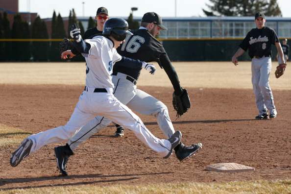 Lake-s-Aaron-Witt-is-beat-to-1st-base-by-Perrysburg-pitcher-AJ-Stockwell