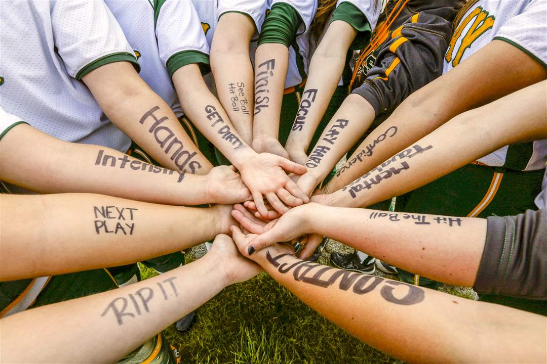 SPT-softball19pClay-players-write-messages-of-inspirati