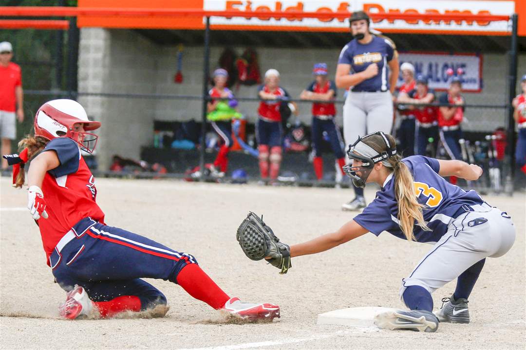 SPT-WhitefordSoftball15pUnionville-Sebewaing-s-Katelyn-Engelhardt-is-tagged-out-on-the-steal-by-Whiteford-s