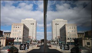 One Government Center reflected off the LaSalle Building on Huron Street.