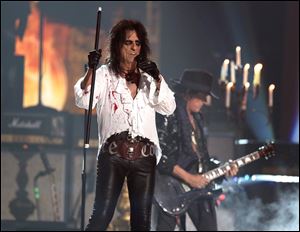 Alice Cooper performs at the 58th annual Grammy Awards in Los Angeles. 