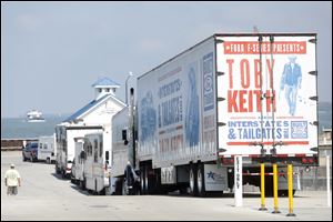 A truck with Toby Keith's tour waits to board the Miller Ferry Wednesday on its way to Put-in-Bay.