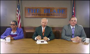 Mayor Paula Hicks-Hudson, left, and challengers Tom Waniewski, center, and Wade Kapszukiewicz, right, during The Blade mayoral debate at The Blade on September 7.