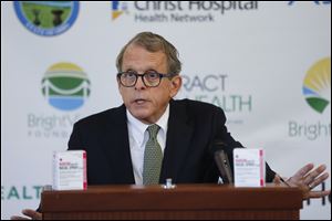Ohio Attorney General Mike DeWine filed a lawsuit against five drug manufacturers in May.