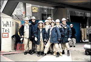 Clarence Wilburn, far left, died over the summer from causes related to his work during Sept. 11 in New York. Barbe Fisher, fifth from left, was at his funeral in July.
