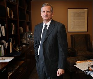 U.S. District Court Judge Jeffrey Helmick.