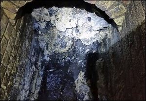 In this undated handout photo issued by Thames Water on Tuesday, a view of a fatberg inside a sewer in Whitechapel, London. B