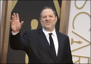 Harvey Weinstein arrives at the Oscars in Los Angeles in March. Weinstein has been fired from The Weinstein Co., three days after an expose detailed decades of allegations of sexual abuse against the movie mogul.