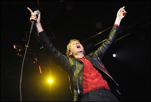 Beck performs onstage at 106.7 KROQ Almost Acoustic Christmas 2016 - Night 2 at The Forum in Inglewood, Calif.
