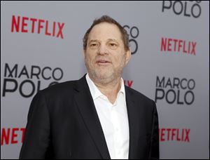 In this 2014 photo, Harvey Weinstein attends the season premiere of the Netflix series 