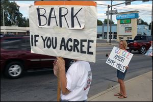 A protest against puppy mills in Toledo in 2015. Today marked the second year of weekly protests by the grass-roots group. The Toledo Area Humane Society will host a public discussion Saturday on puppy mill cruelty in Ohio. 