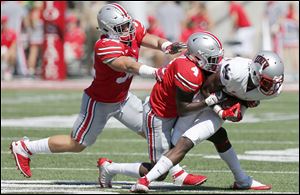 Ohio State defenders Tuf Borland, left, and Jordan Fuller, are two players whose roles have been decided, though Borland will not play Saturday because of an injury.