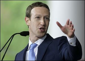 Facebook CEO Mark Zuckerberg delivers the commencement address at Harvard University in Cambridge, Mass. 