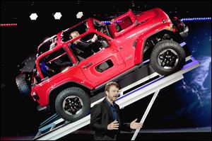 Mike Manley, president and CEO of Jeep, introduces the 2019 Jeep Wrangler during the Los Angeles Auto Show, Wednesday, Nov. 29, 2017. 