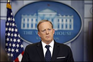 Former White House press secretary Sean Spicer, shown in June of 2017, is scheduled to speak at an Authors! Authors! event in Toledo.