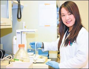 Zehui (Lesley) Li, a student at the University of Toledo, is studying chemical messengers between cells and how they can potentially be used to treat cancer.