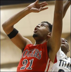 Rogers' Christian Smith, shown in a game earlier this season, scored 14 points in Friday's win over Start.