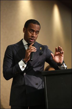 Jeff Johnson, a UT grad and BET personality, gives the keynote address during the annual scholarship breakfast hosted by the local UT chapter of Alpha Phi Alpha at The Pinnacle on Saturday.