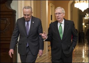 Sen. Chuck Schumer (D., N.Y.), left, and Sen. Mitch McConnell (R., Ky.) must work out a deal to save the Dreamers.