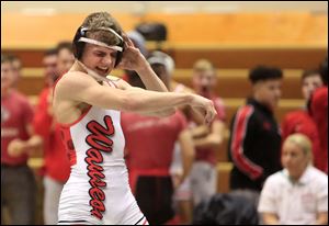 Wauseon's Nolan Ray celebrates after defeating Mentor Lake Catholic's Conor McCrone at 126 pounds. The Indians beat Lake Catholic 48-12 to take the Division II state dual title.
