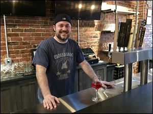 Nick Scott, owner of Wild Brewing in Grand Rapids, says he's converting people one drink at a time.