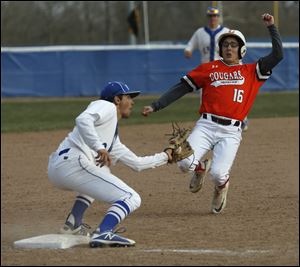 Anthony Wayne's Brock Nartker tags out Southview's Sammy Kale at third base on an attempted steal during Wednesday's NLL meeting.