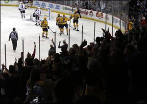 Walleye fans go wild after Christian Hilbrich scored a goal against the Indy Fuel March 11, 2018 at the Huntington Center. The Walleye and the Fuel square off in an ECHL playoff series beginning Friday in Toledo.