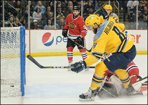 Toledo Walleye forward Christian Hilbrich scores a goal during Friday's ECHL first round playoff game against the Indy Fuel. The Walleye take a 1-0 series lead into Game 2 Sunday at the Huntington Center.