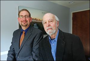 Financial planner Josh Mudse, left, and Bowling Green State University Professor Emeritus Tom Klein are planning an upcoming event at Bowling Green State University to teach people how to invest in a socially responsible manner. 