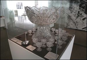 An ornamented glass punch bowl on display during the media preview of the Celebrating Libbey Glass, 1818-2018, exhibit at the Glass Pavilion.