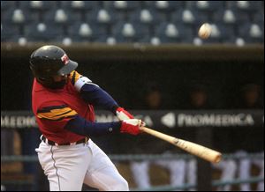 Toledo's Ronny Rodriguez swings at a pitch at Fifth Third Field earlier this season. Rodriguez homered twice in the Mud Hens' lopsided win at Louisville Sunday.