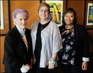 From left: Darleen Beals, Johey Crawford, and Lareiva Cooper during the CASA awards at The Pinnacle in Maumee.