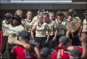 Members of the Perrysburg softball team after a 2-1 loss to Lakota West in Thursday's Division I state semifinal at Firestone Stadium in Akron.
