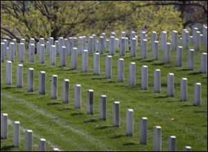 Graves housing on the remains of U.S. military personnel are seen at Arlington National Cemetery in Arlington, Va.