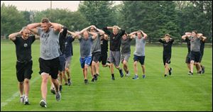 Members of F3, a faith-based men's exercise group, run Wednesday, June 20, 2018, at Pacesetter Park in Sylvania.