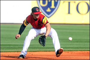 The Mud Hens' Pete Kozma fields the ball against the Indianapolis Indians last weekend. The Mud Hens fell 14-3 at Rochester on Thursday.