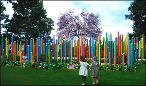 Minneapolis artist Randy Walker’s proposal 'Close, Closer, Closest,' shown in this artist's rendering was selected by the Toledo Arts Commission for construction at Close Park. The installation includes approximately 400 colorfully painted steel poles representing each house in the immediate neighborhood.