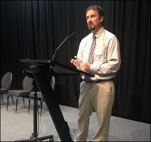Ohio Sea Grant and OSU Stone Laboratory director Chris Winslow at Understanding Harmful Algal Blooms: State of the Science, held Thursday at the Stranahan Theater.